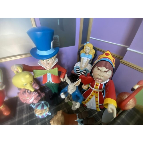 1 - A collection of 9 Alice in Wonderland large figures, including Alice, the Mad Hatter, the Queen, Whi... 