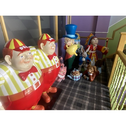 1 - A collection of 9 Alice in Wonderland large figures, including Alice, the Mad Hatter, the Queen, Whi... 