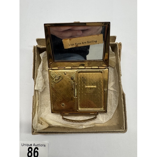 86 - A good lot of compacts including musical examples, hangbag etc