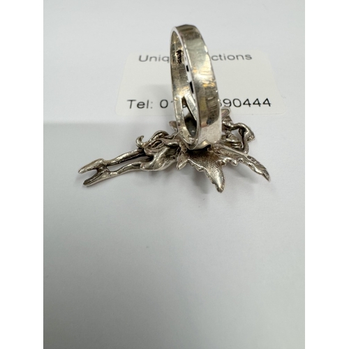 2 - A silver fairy style ring (7.11 grams)