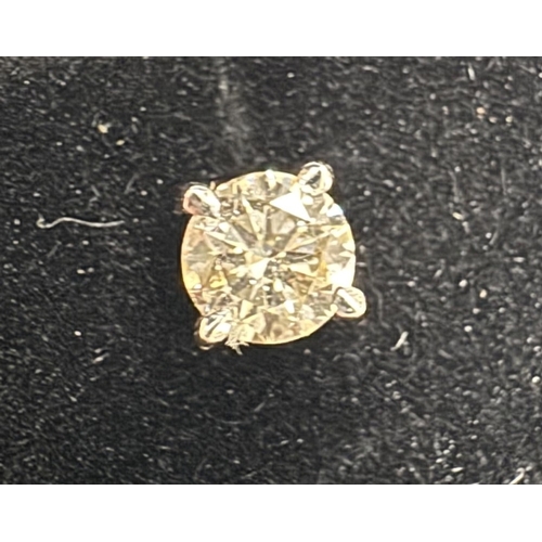 21 - A pair of 14ct white gold diamond stud earrings of 40 points total