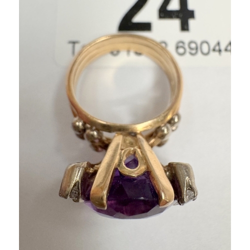 24 - A substantial yellow gold amethyst & diamond ring (8.80 grams)