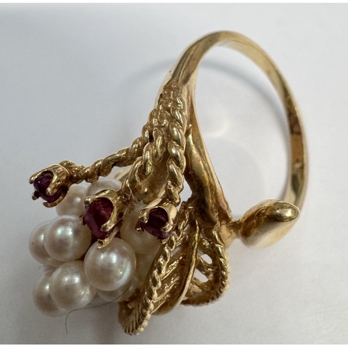 29 - A 14ct yellow gold freshwater pearl & ruby ring (6.68 grams)