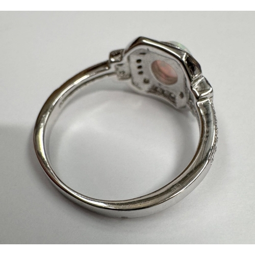 9 - A silver CZ & opal panelled ring (3.45 grams)
