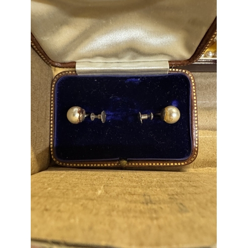 41 - An unmarked white gold brooch (tests as gold), A polished stone necklace etc