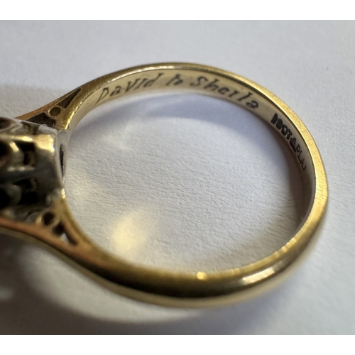 51 - An 18ct gold & platinum single stone diamond ring