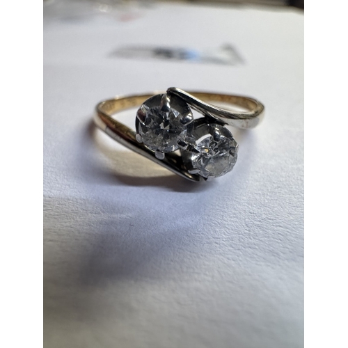 52 - An 18ct gold & platinum 2 stone diamond ring