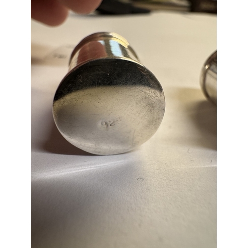 57 - A miniature silver salt & pepper in the shape of beer tankards