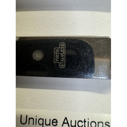 58 - A quantity of silver items including napkin ring, spoon, pepperette, thimble & silver handle knife a... 