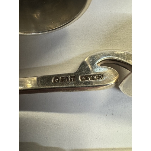 58 - A quantity of silver items including napkin ring, spoon, pepperette, thimble & silver handle knife a... 