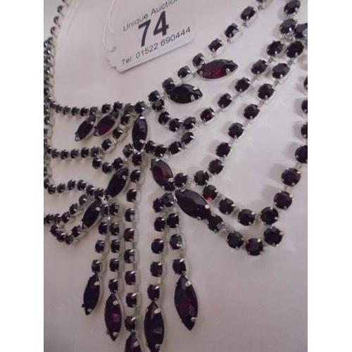 74 - A good quality dark red stone set necklace.