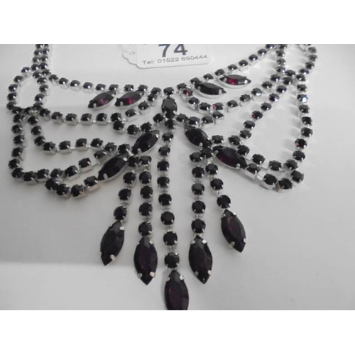 74 - A good quality dark red stone set necklace.