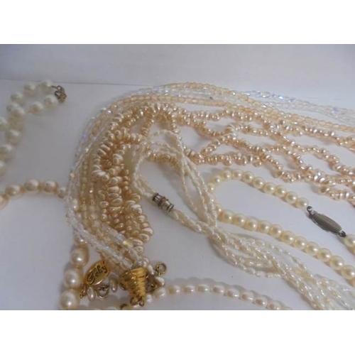 75 - A nice lot of mainly pearl necklaces all in good condition.