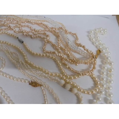 75 - A nice lot of mainly pearl necklaces all in good condition.