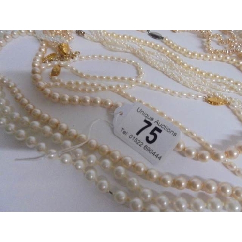 75 - A nice lot of mainly pearl necklaces all in good condition.