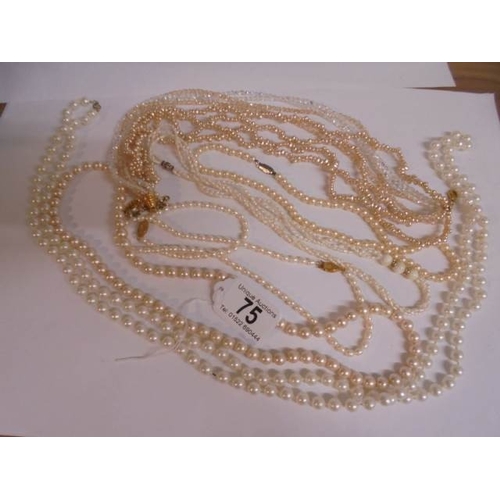 75 - A nice lot of mainly pearl necklaces all in good condition.