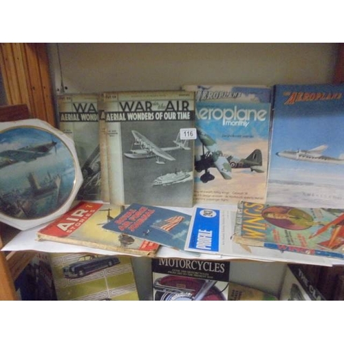 116 - A shelf of early 20th century War related magazines.