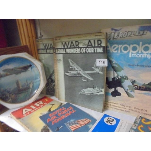 116 - A shelf of early 20th century War related magazines.