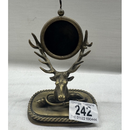 242 - A game themed pocket watch stand in the form of a deers head & antler