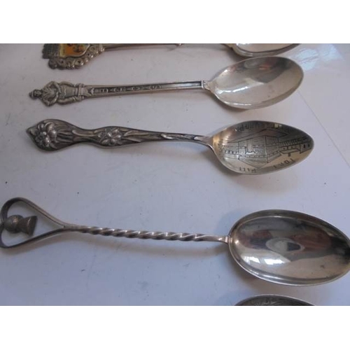 53 - Seven silver spoons including souvenir examples, and 1 silver plate total weight 95 grams