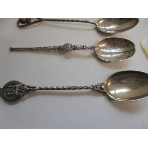 53 - Seven silver spoons including souvenir examples, and 1 silver plate total weight 95 grams
