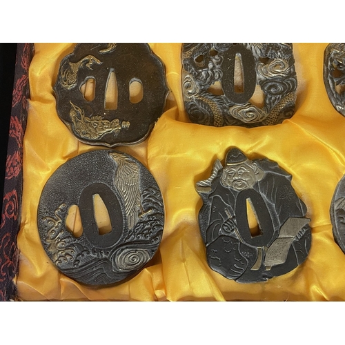 54 - A boxed set of 6 Japanese tsubas