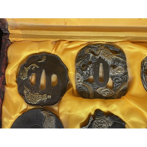 54 - A boxed set of 6 Japanese tsubas