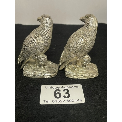 63 - A pair of silver plated eagle style condiments