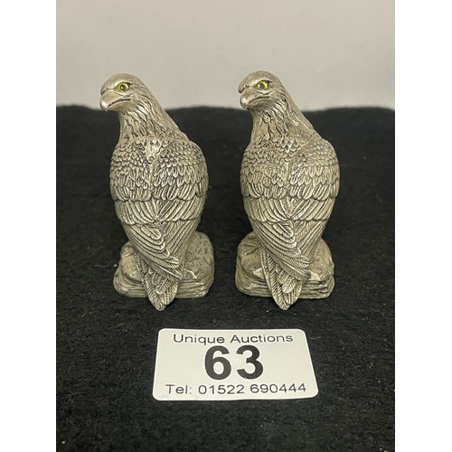 63 - A pair of silver plated eagle style condiments