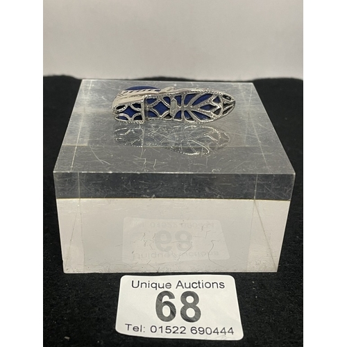 68 - A silver shoe pin cushion