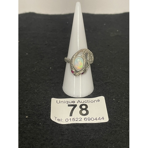 78 - A silver snake head ring with opal panel