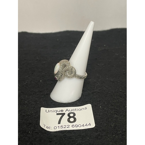 78 - A silver snake head ring with opal panel