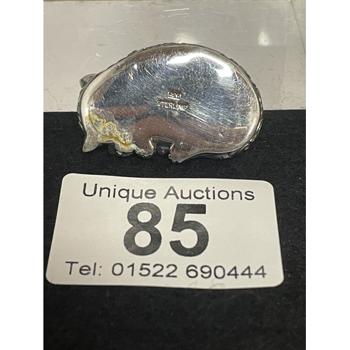 85 - A silver cat recumbent figure