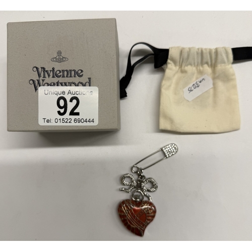 92 - A boxed Vivienne Westwood enamel heart watch brooch