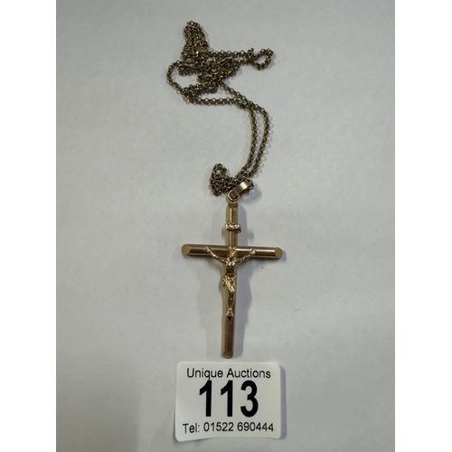 113 - A 9ct gold cross & chain (10.26 grams)
