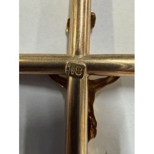 113 - A 9ct gold cross & chain (10.26 grams)