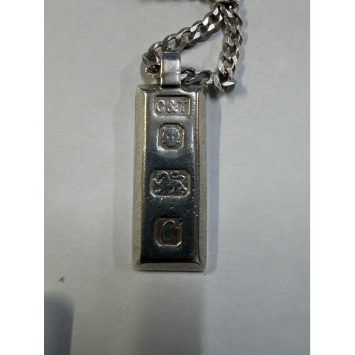 115 - A silver chain with ingot & silver chain (35 grams)
