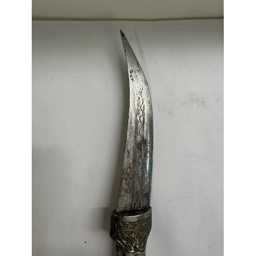 139 - A vintage oriental dagger / knife with decorative metal sheath