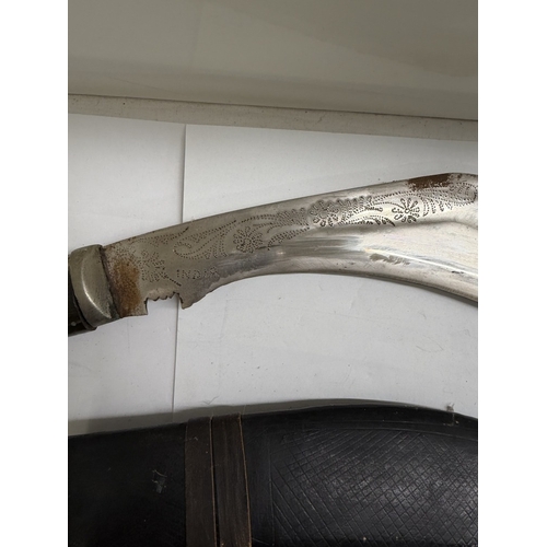143 - An Indian kukri knife & sheath