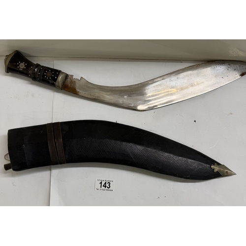 143 - An Indian kukri knife & sheath