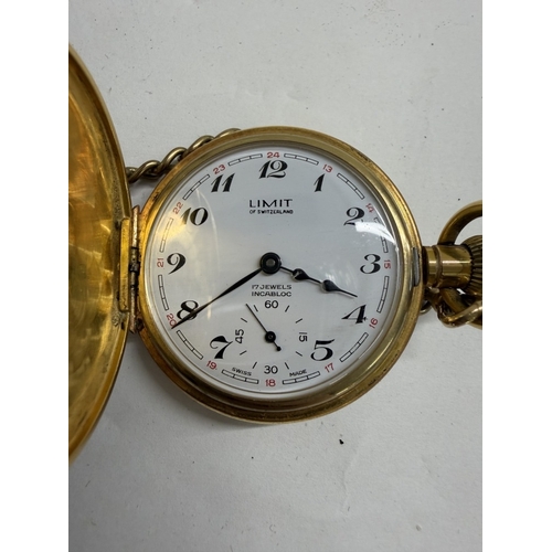 145 - An oak pocketwatch display stand with gold tone Limit 17 Jewels incabloc pocket watch & brass chain