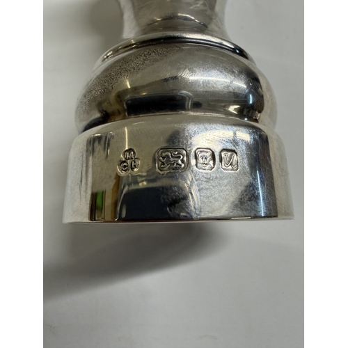 146 - A set of sillver salt & pepper pots (Gross weights 135.21 grams & 143.49 grams)