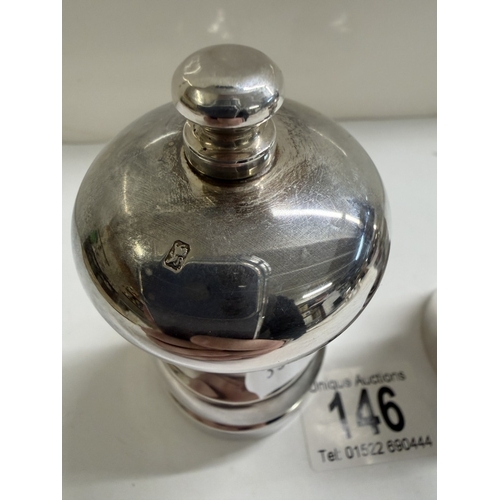 146 - A set of sillver salt & pepper pots (Gross weights 135.21 grams & 143.49 grams)
