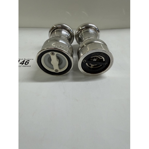 146 - A set of sillver salt & pepper pots (Gross weights 135.21 grams & 143.49 grams)