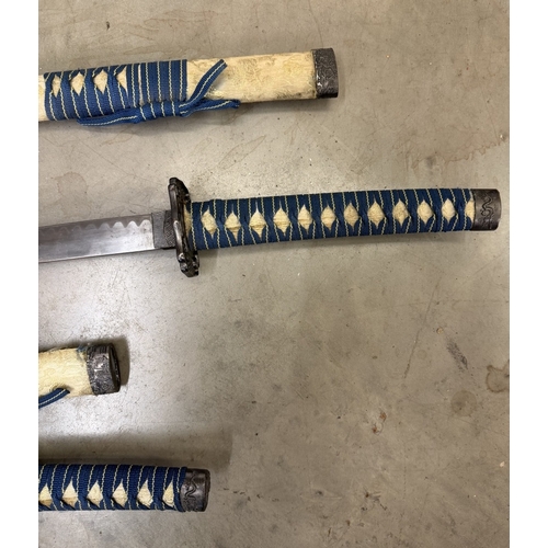 152 - A pair of Japanese decorative swords