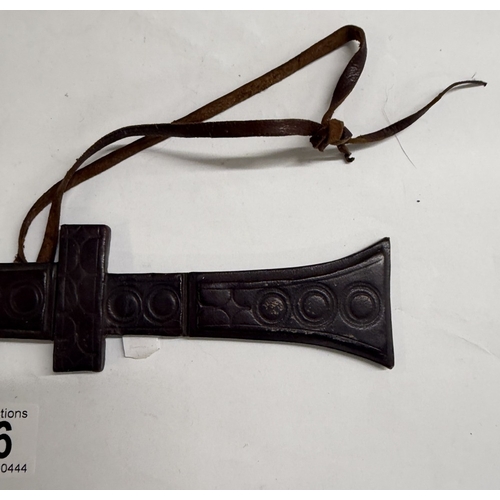156 - An African leather scabbard for a bracelet dagger