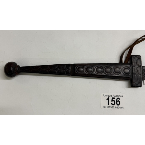 156 - An African leather scabbard for a bracelet dagger