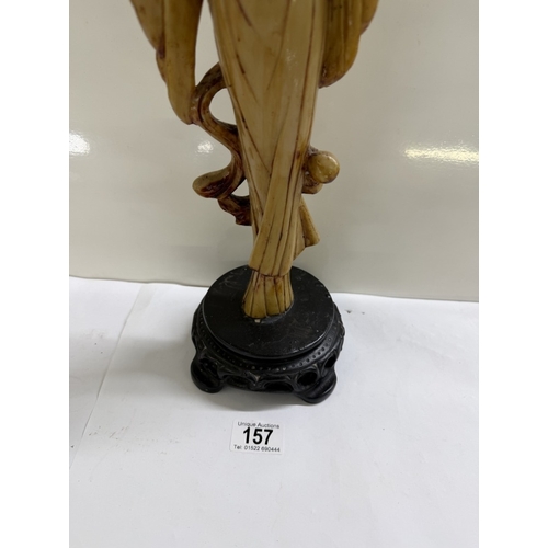 157 - A Chinese resin figurine of a scholar / gentleman