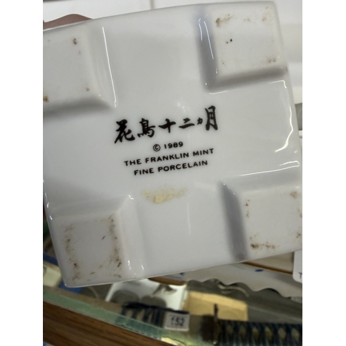 164 - A Franklin Mint birds & flowers of The Orient tea set with teapot, creamer & base