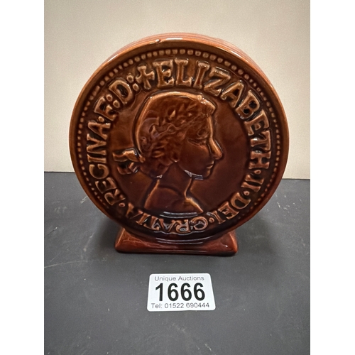 1666 - A vintage ceramic money box modeled as a large 1967 one penny coin